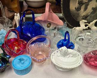 Baskets and cat on a nest  glass