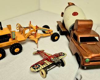 Large selection of antiques, primitives and collectibles. Vintage toys- Marx U. S. Army windup airplane and Lumar Power grader. Structo concrete truck