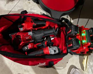 Brand New Milwaukee Grinder, Sawzall, Chainsaw, Light w 4 Batteries and Charger