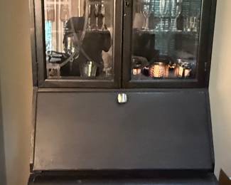 Beautiful black secretary that has been made into a bar