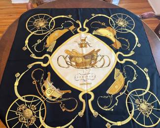 authentic Hermès "Springs" silk scarf, a classic design featuring horse-drawn carriages and equestrian elements
C 1990s
100% silk