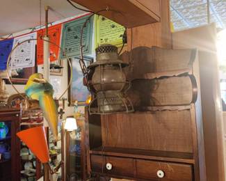 Antique train lantern, wall shelf