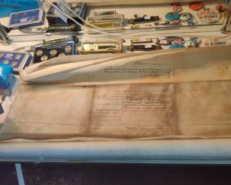 Land deed 
Coins and pocket knives