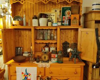 Antique bottles and crocks and cast iron