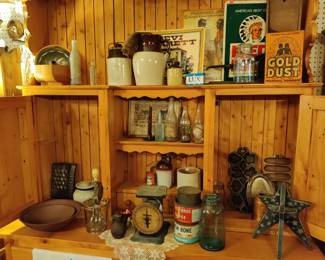 Antique bottles and various stoneware