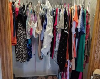 Back bedroom. All clothing in this closet is new with tags!