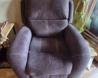 Matching couch in sun room is also reclining.