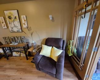 This family room also has a table and two hanging racks of purses which will be added to pictures on Monday.
