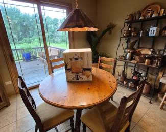 Shannon Chrystal by Godinger beverage dispenser. Copper chandelier is part of sale.