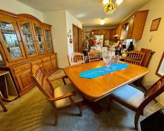 Dining room set, table has leaf and 6 chairs, china cabinet