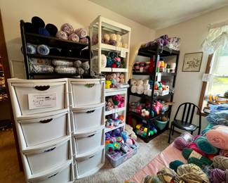 Double cabinet full of fabric for quilting and other crafts