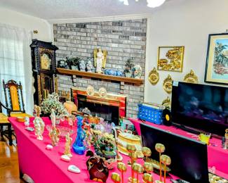 Lots of beautiful brass and glass items.