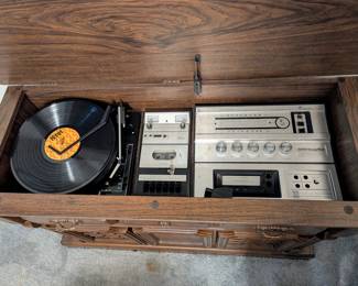 Stereo with phonograph, 8-track player, cassette player, AM/FM radio (phonograph works sporadically).