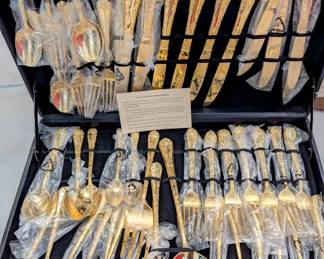 Set of Gold tone SilverWare - $100.