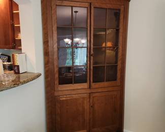 Antique corner cabinet, shelves have plate tracks
