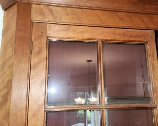 Antique corner cabinet, shelves have plate tracks
