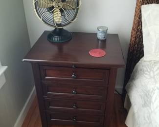 Nightstand; table fan