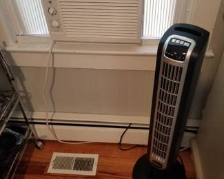 Window AC unit NOTE: owner keeping tower fan; tower fan