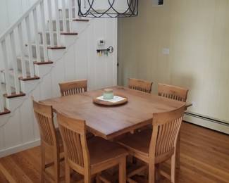 High top dining set seats 8; chandelier