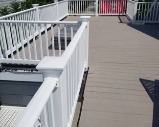 Nearly new Trex decking; limited amount of vinyl railing
