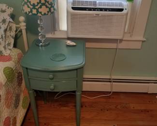 Nightstand; table lamp; Window AC unit