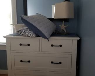Contemporary 4-drawer dresser; table lamp; mirror