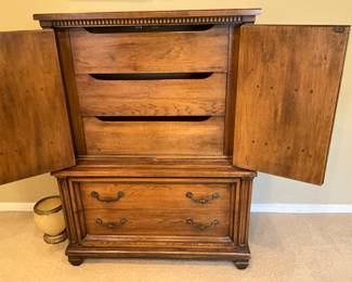 Armoire/chest open in master bedroom