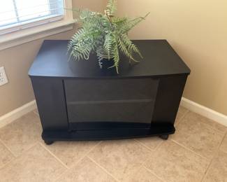 On mantle in living room - TV or electronics cabinet