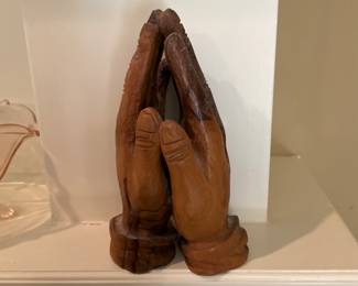 Next items are on mantle in living room - praying hands - hand carved