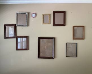 Wall of frames in patio room