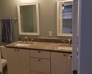 Updated double bath vanity; vanity mirrors; vanity lights
