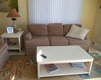 Neutral tan couch by Braxton Culler; coastal chic coffee table & end table with rope accents