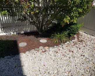 Gravel; stones; plants