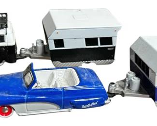 Pair of Maisto 164 Tow  Go Collectibles