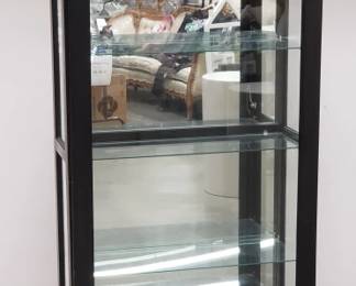 Home Meridian ebonized mirrored back curio cabinet. Lot # 92