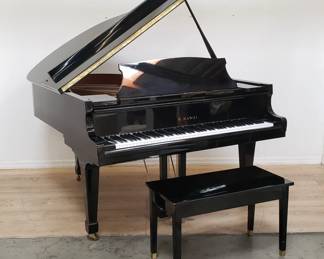 Kawai lacquered baby grand piano. This Kawai upright piano comes directly from the personal collection of Richard Simmons and was proudly displayed and used in his iconic residence. A cherished piece of his creative life, this piano was used by Simmons to compose and record original music over the years. Lot #136