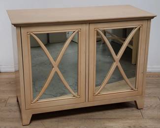 Modern blonde cabinet with glass doors. Lot # 90