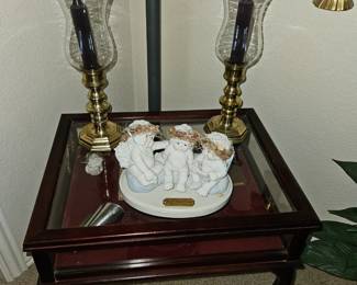 The chubby angels hanging out
Brass and glass cable holders