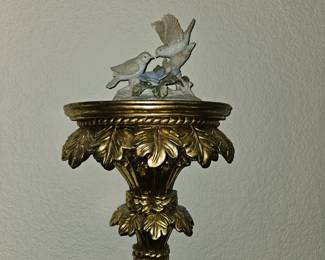 Gold wall shelf with ceramic playful birds