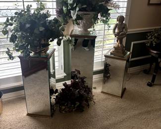 Plants and mirrored stands