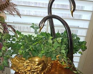 “Brass” swans