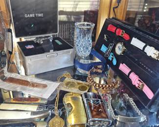 Pocket knives, lighters, Waterford bud vase , watch and set, ID bracelets copper bracelets