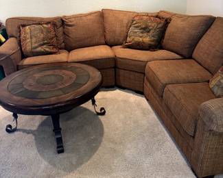 Beautiful brown immaculate condition sectional
Round wood and metal coffee table