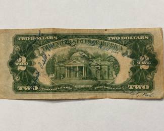 1928 D $2.00 Bill signed by a group of WWII Army Vets on the front. On the back different bases are listed: Laredo Army Air Field(LAAF), Camp Beauregard, Sheppard Field TX, and a couple of others.