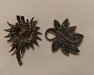 Sterling vintage brooches.