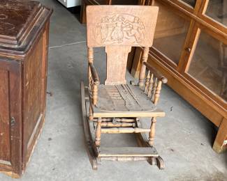 Antique child’s rocker highchair