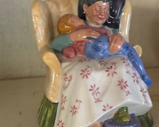 This is a Royal Doulton figurine titled "Sweet Dreams," also known by its model number HN2380
