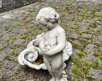 Lovely concrete statue...could be a fountain with a bit of TLC