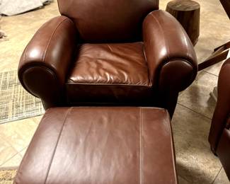This great Pottery Barn brown leather chair and matching ottoman go with the leather couch...wonderful pieces, comfy and great PB quality.