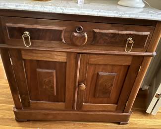 Lovely is this piece!  Beautiful marble topped Antique chest...it is just beautiful!